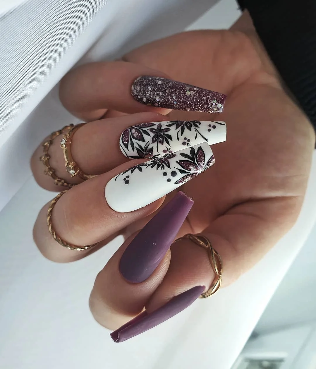 fall long nails 2026 Plum Floral Nails With Sparkling Autumn Details