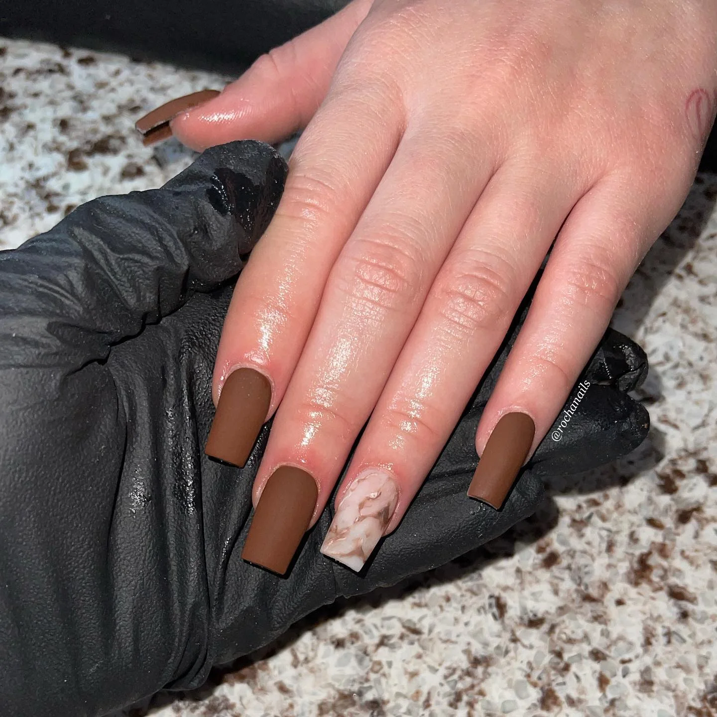 fall matte nails 2026 Chocolate Brown With A Soft Marble Accent