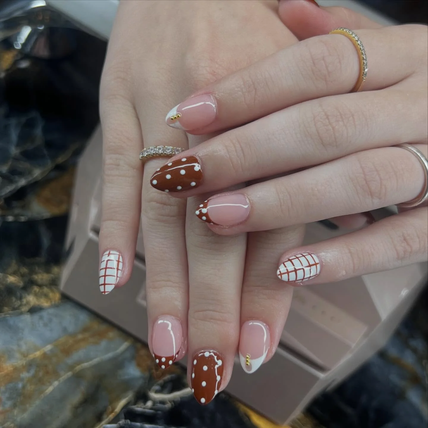 fall nail inspiration 2026 Playful Cocoa Polka Dot And Grid Nail Art