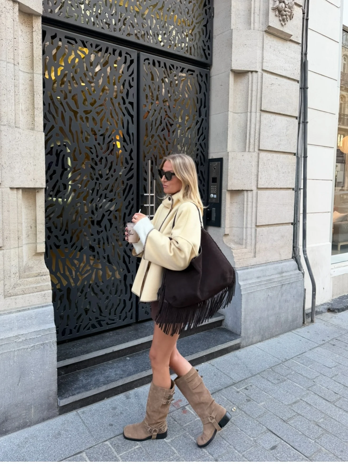 september outfit ideas 2026 Cream Sweater Dress With Fringe Bag And Tall Boots