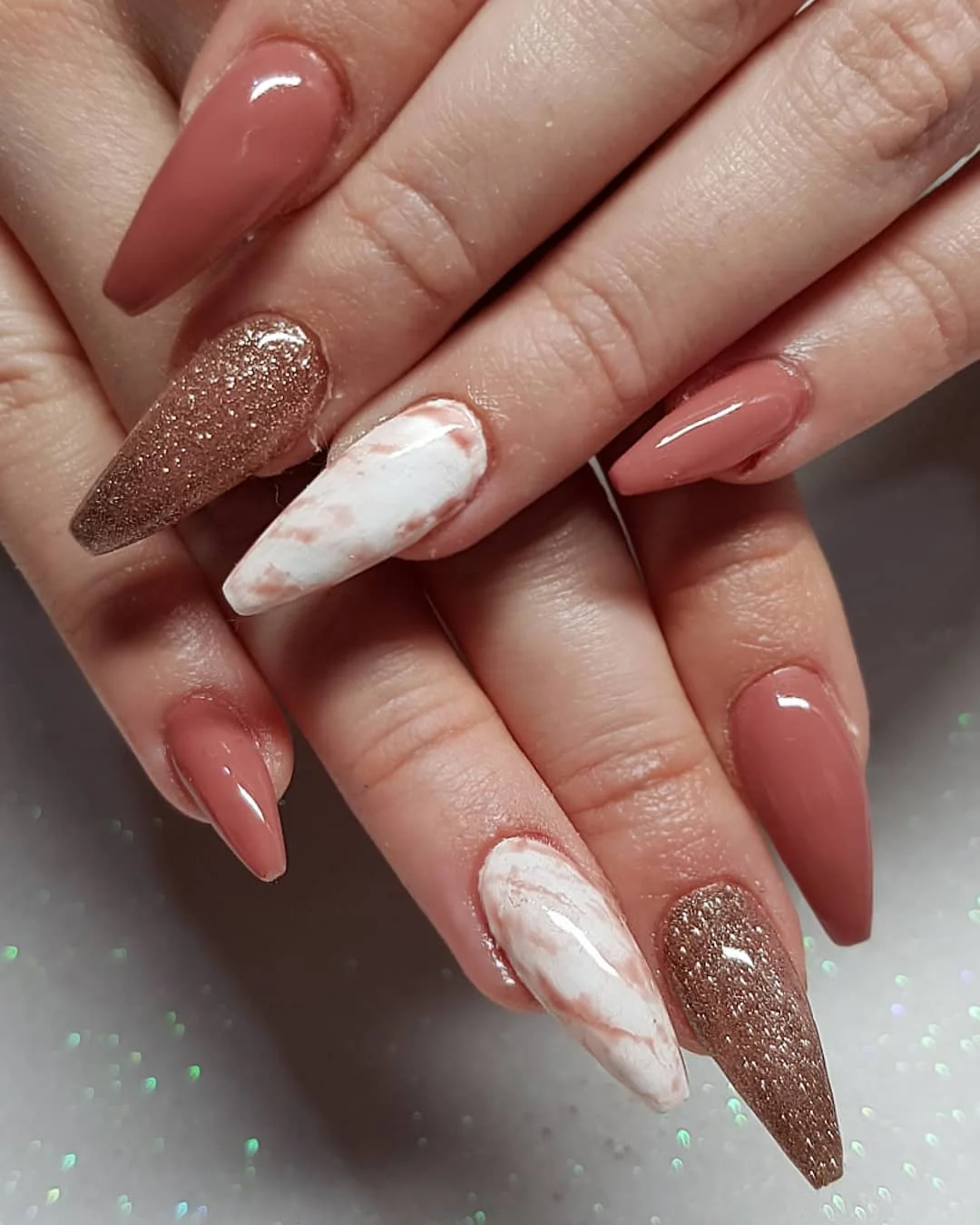 fall long nails 2026 Rosewood Almond Nails With Marble And Champagne Glitter