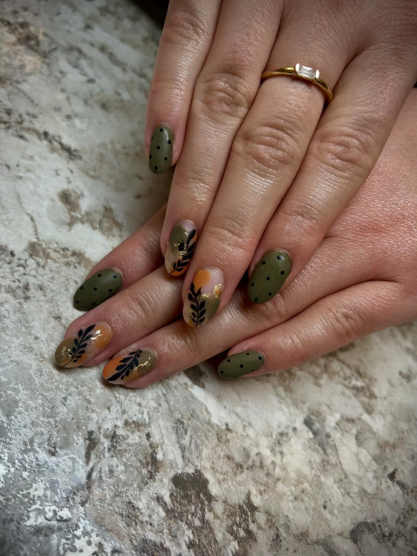 fall medium length nails 2026 Olive Green With Black Dots And Autumn Foliage