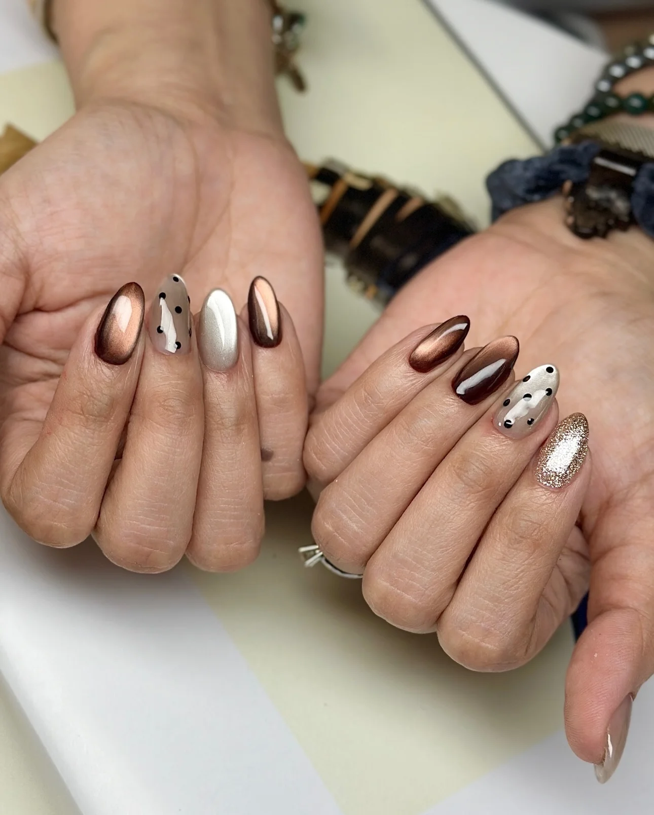 fall short almond nails 2026 Bronze Chrome Mixed With Playful Polka Dot Accents