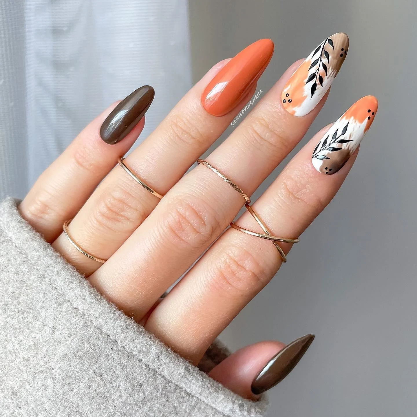 fall long nails 2026 Orange And Chocolate Almond Nails With Botanical Accents