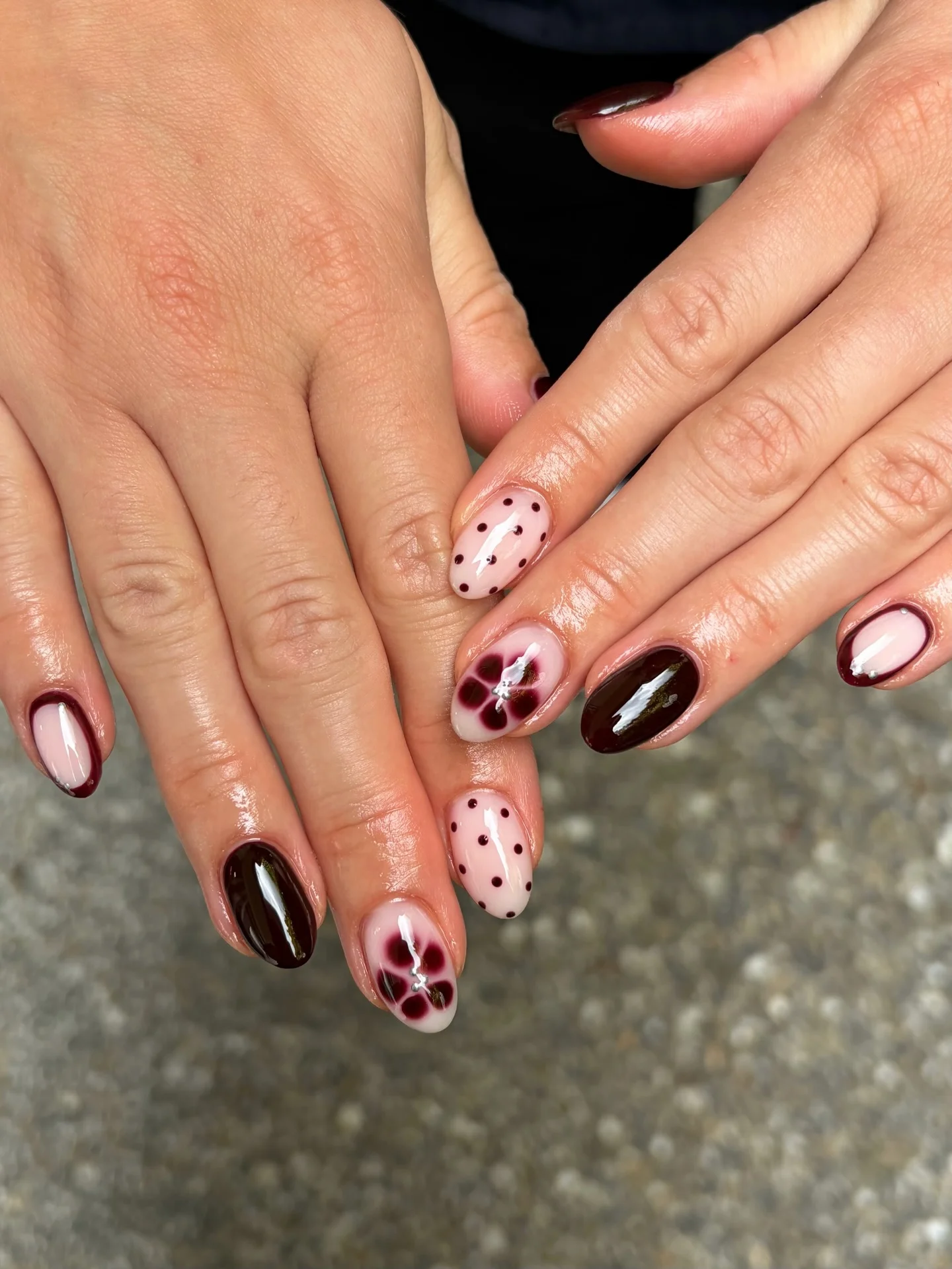 fall nail trends 2026 Burgundy Floral And Polka Dot Romance