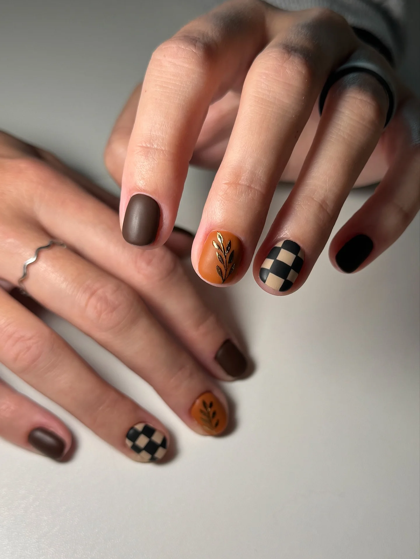 fall matte nails 2026 Chocolate Brown With Amber And Checkerboard Details