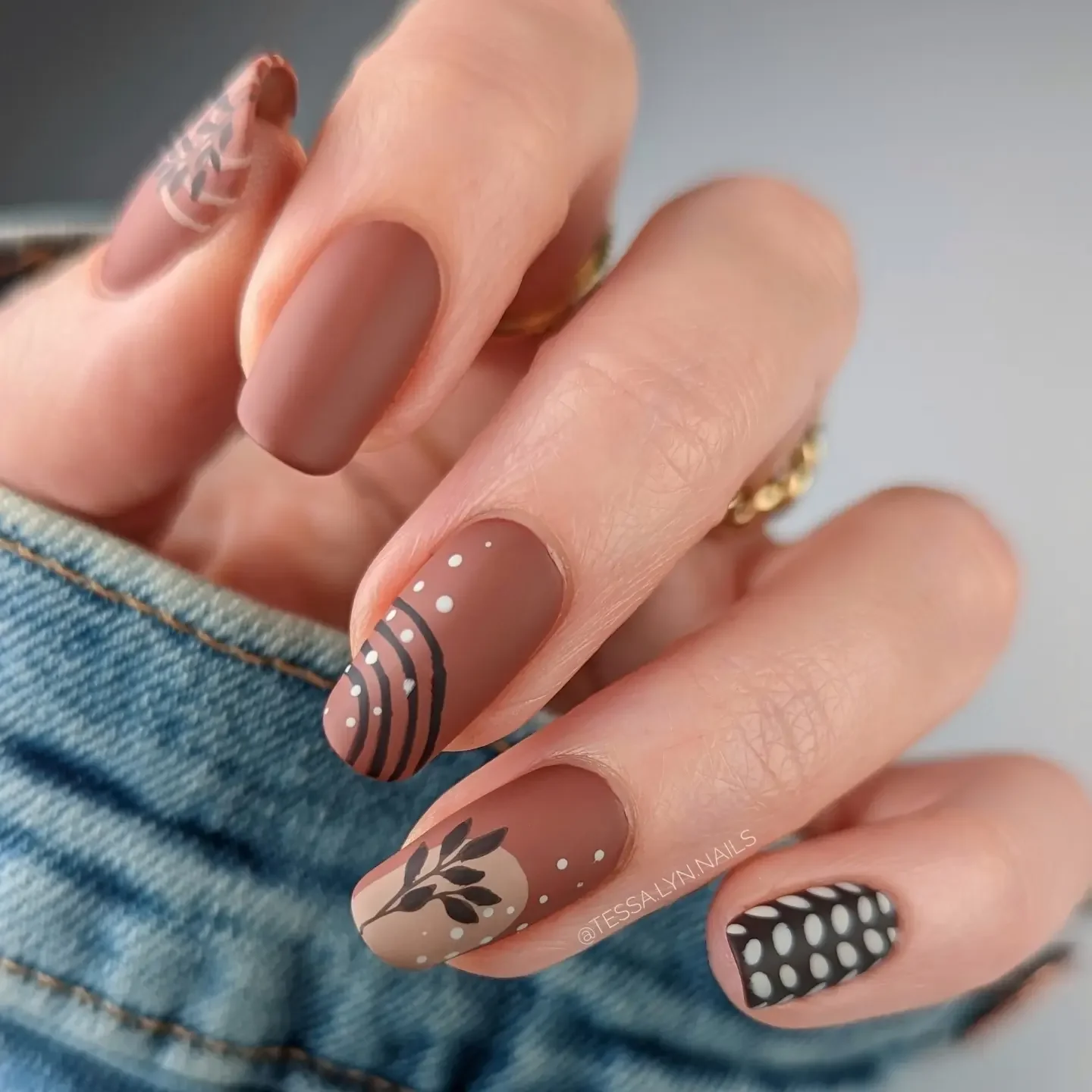 fall medium length nails 2026 Mocha Matte Nails With Graphic Botanical Accents