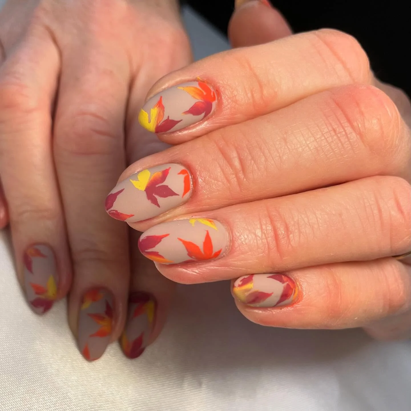 fall nail inspiration 2026 Soft Maple Leaf Art With Neutral Elegance