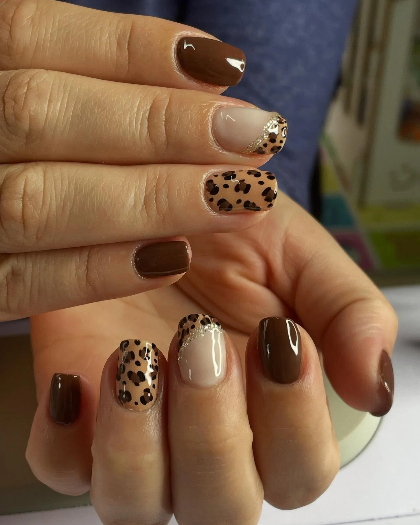 fall gel nails ideas 2026 Chocolate Leopard Nails With Glitter French Accents