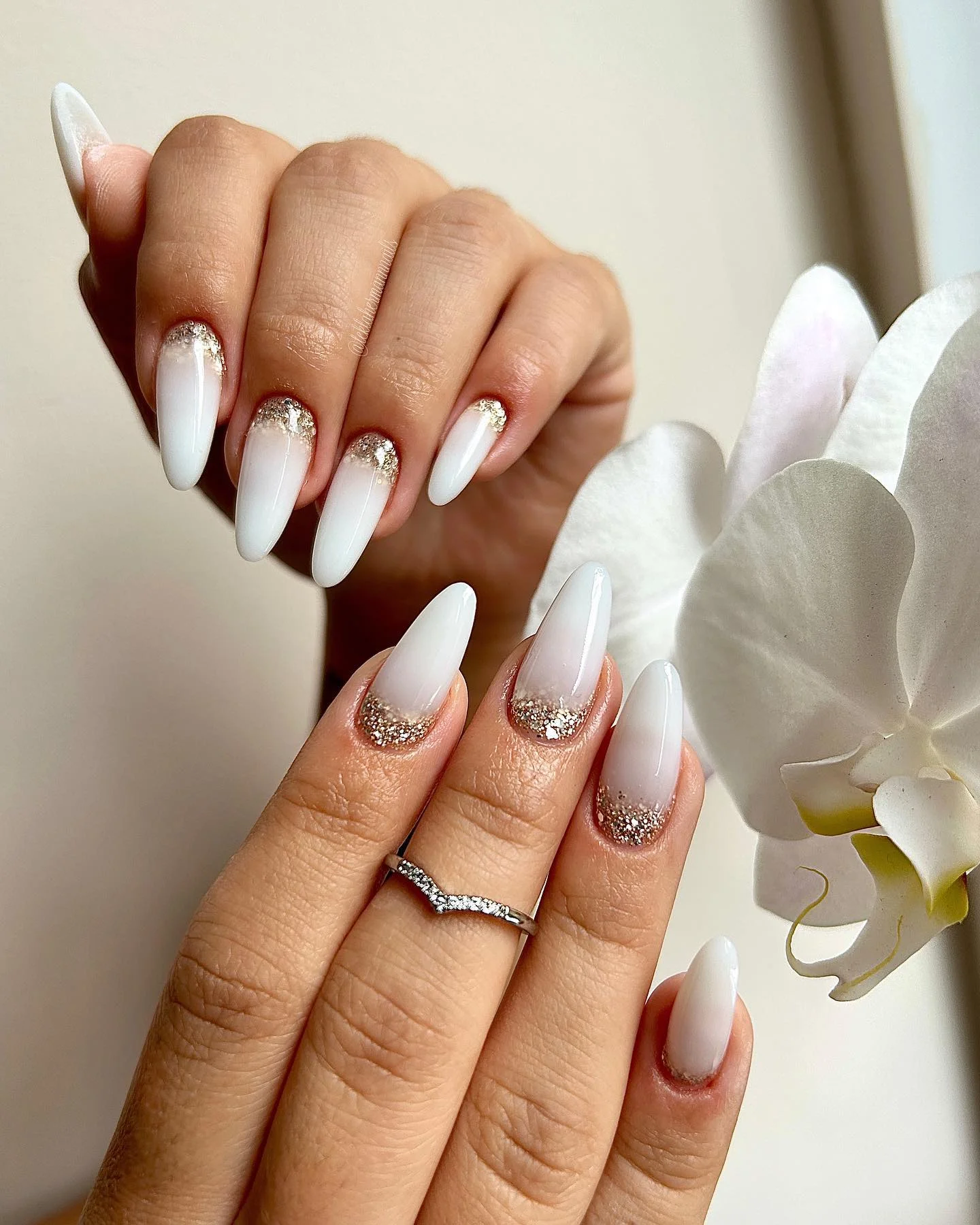 fall wedding nails 2026 Soft White Ombre Nails With Champagne Glitter Elegance