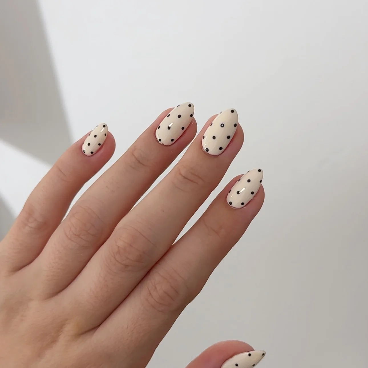 polka dot fall nails 2026 Creamy White Almond Nails With Fine Black Dots