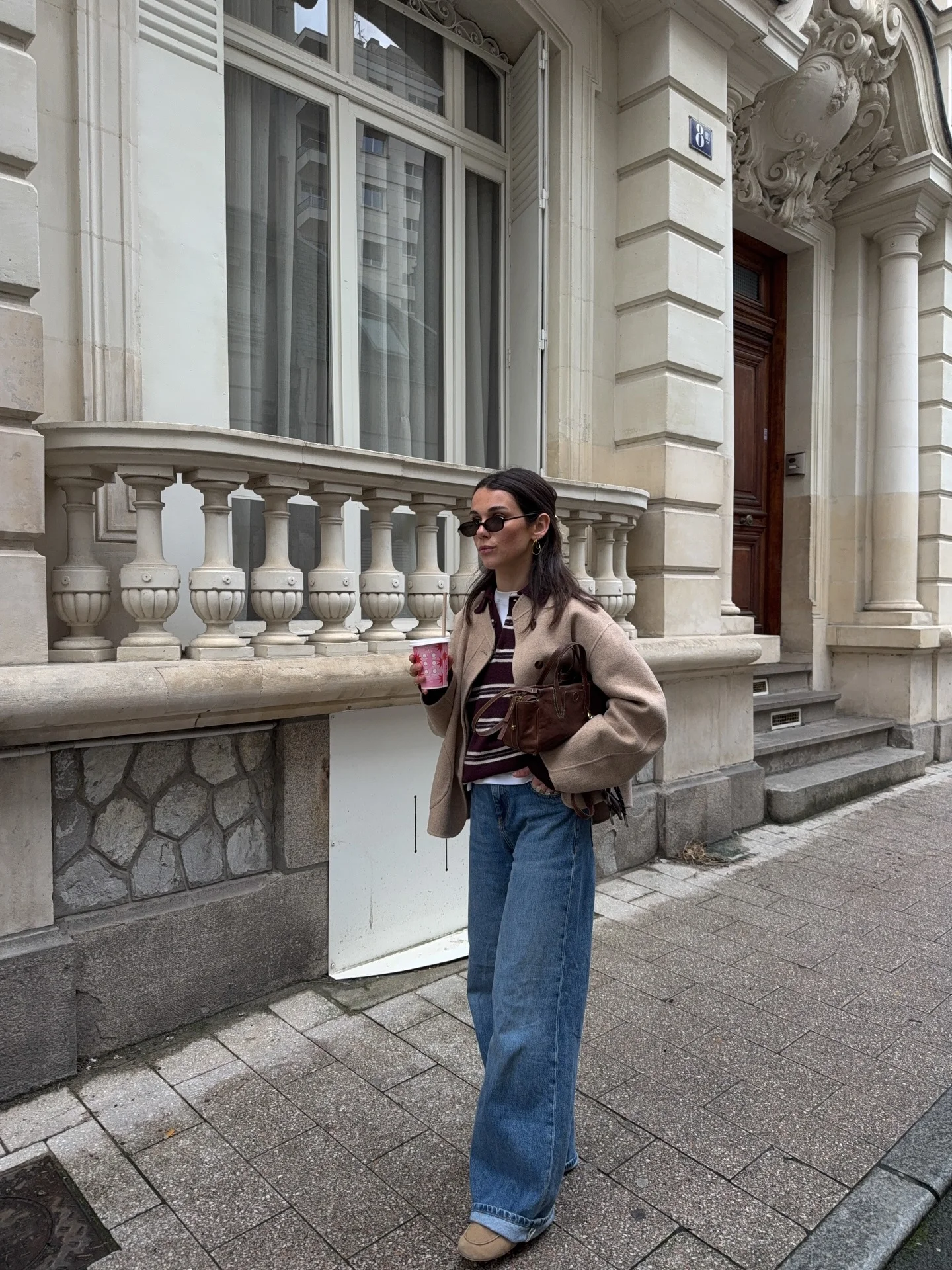 september outfit ideas 2026 Beige Jacket With Striped Knit And Wide-Leg Jeans