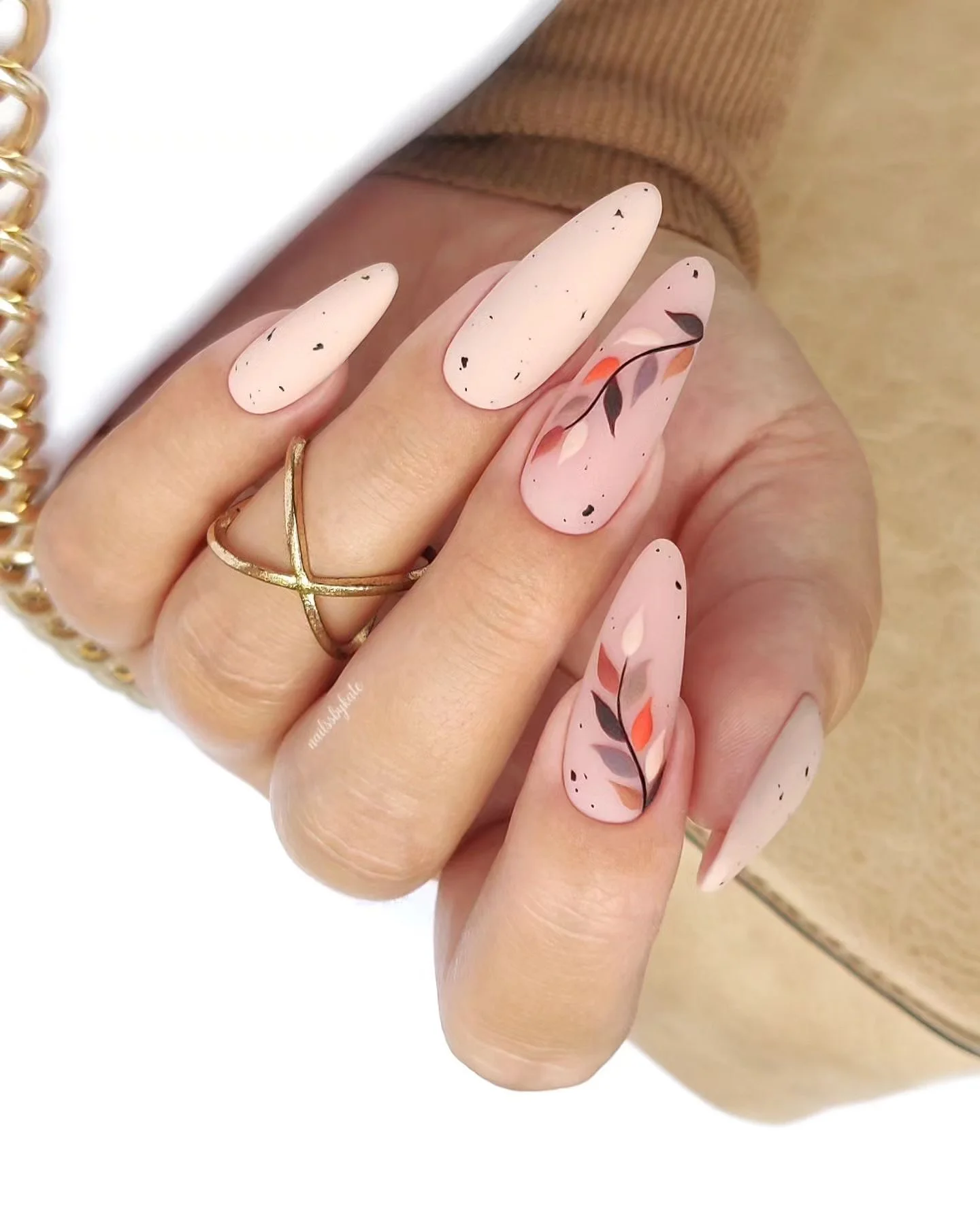 fall long nails 2026 Soft Blush Almond Nails With Abstract Autumn Leaves