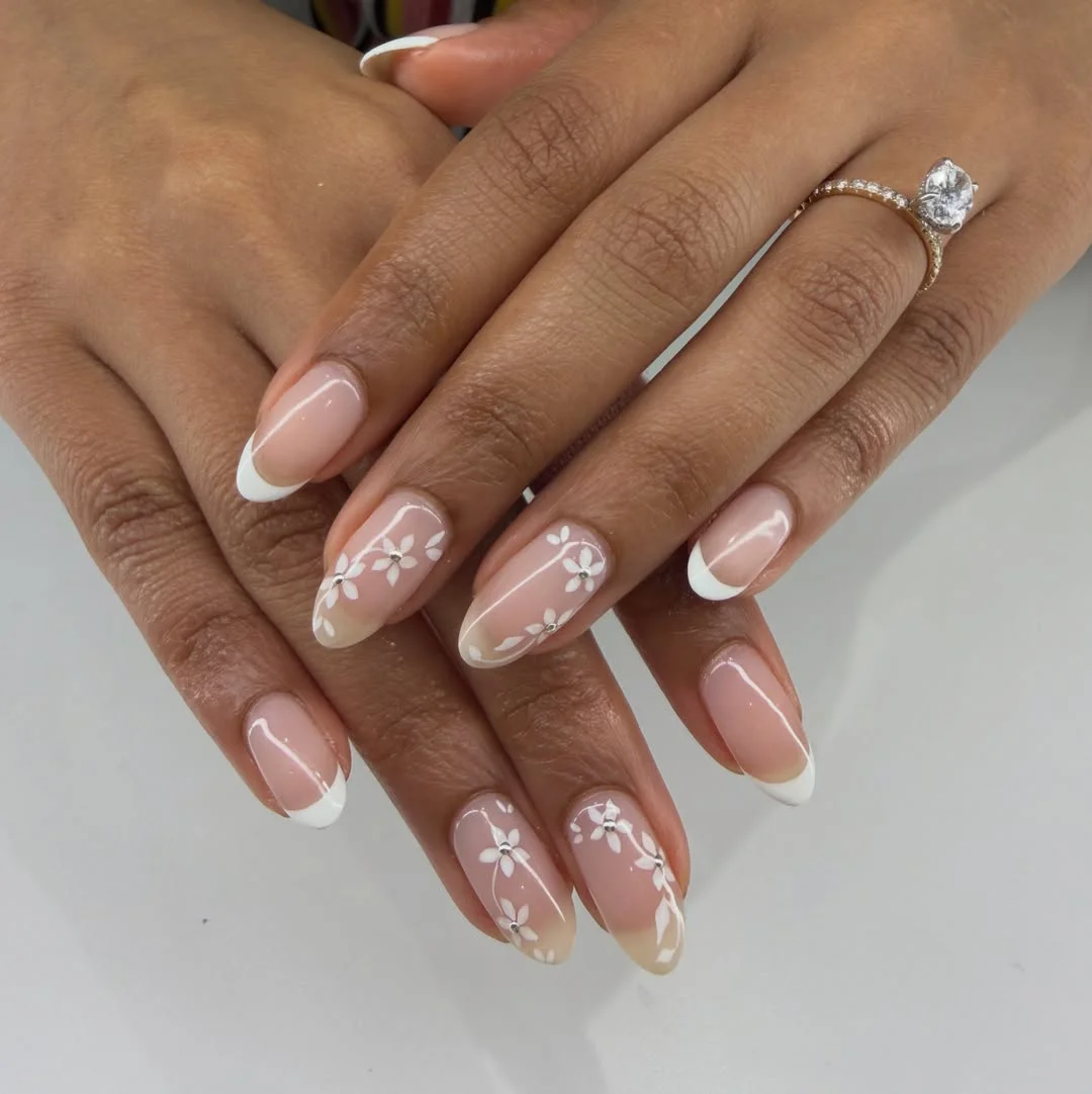 fall wedding nails 2026 Classic French Tips With Delicate Daisy Details