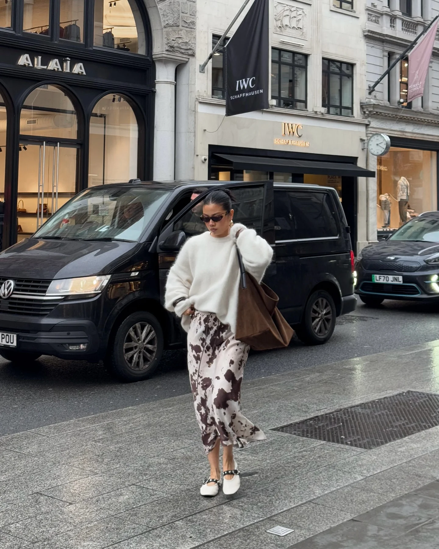 september fashion trends 2026 Cream Knit With A Printed Midi Skirt