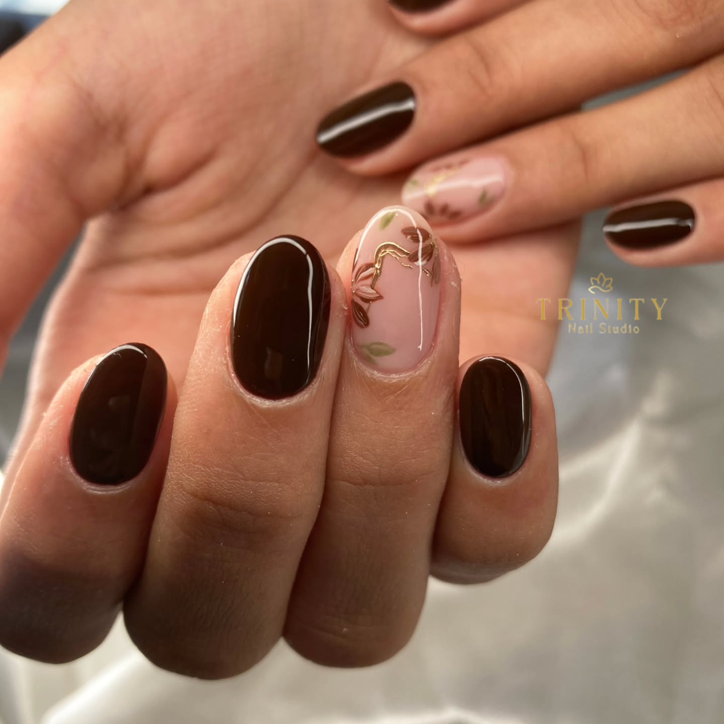 fall gel nails ideas 2026 Classic Espresso Nails With Delicate Botanical Accent