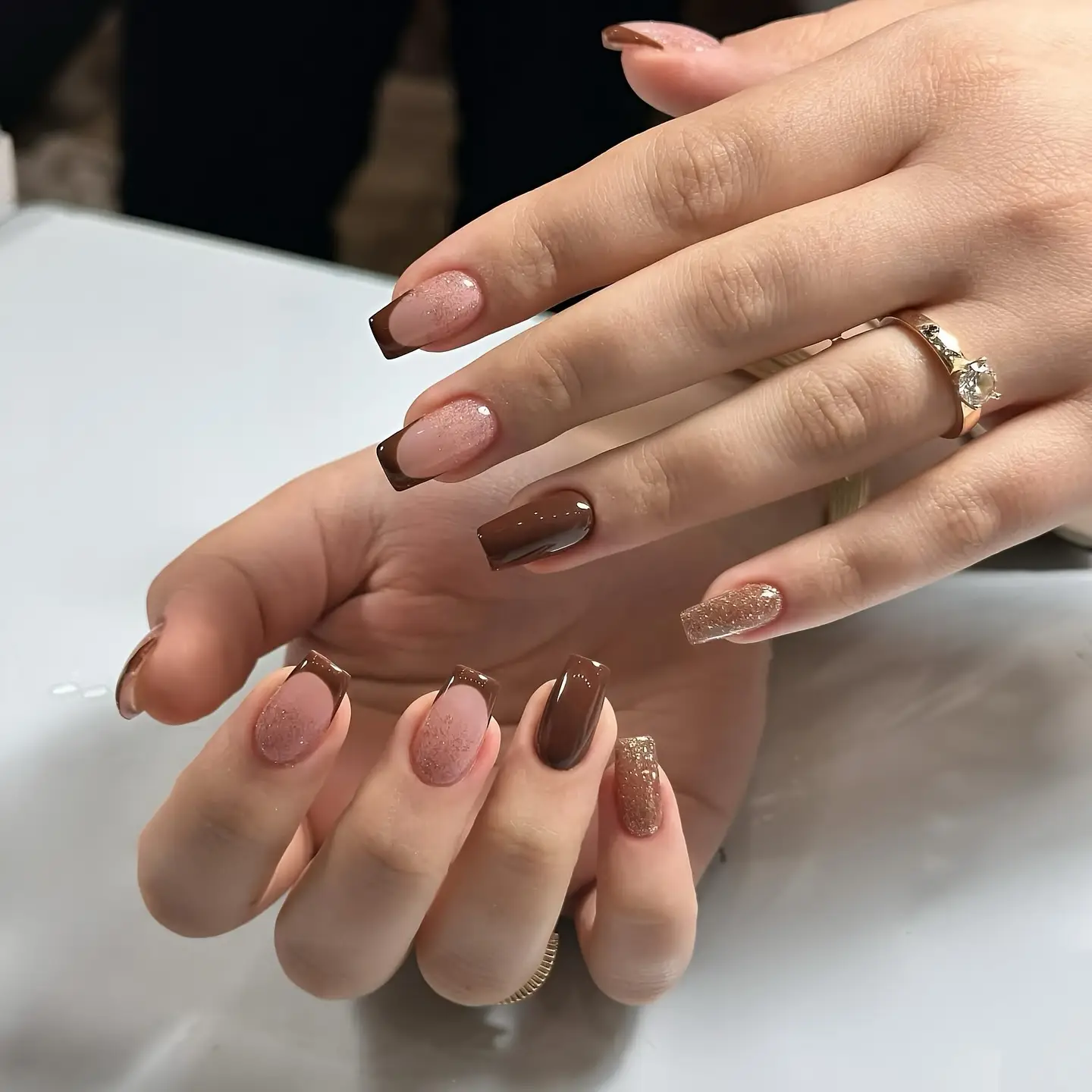 fall nails for pale skin 2026 Mocha French Tips With Rose Gold Glitter