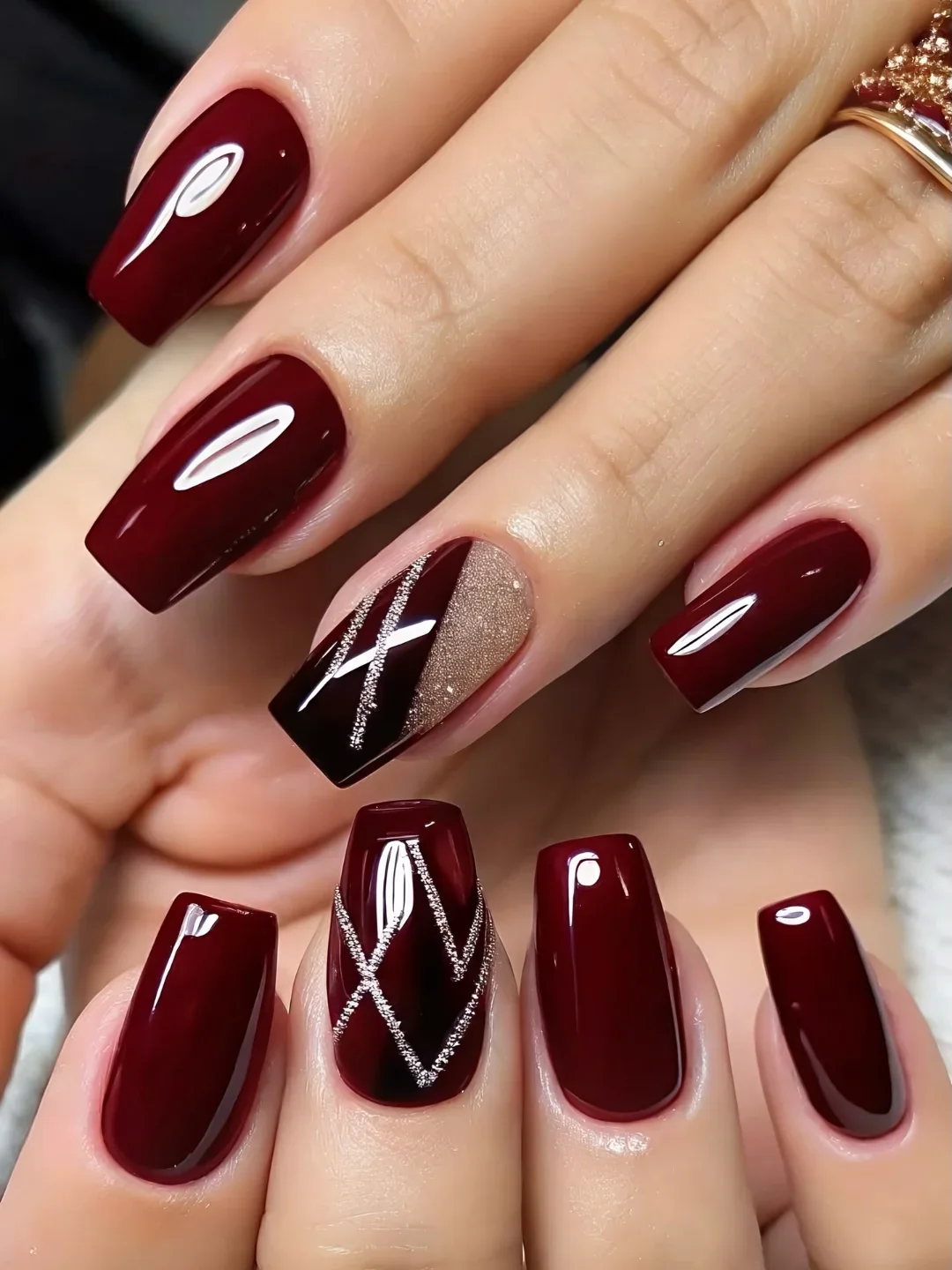 fall short coffin nails designs 2026 Glossy Burgundy With Silver Geometric Sparkle
