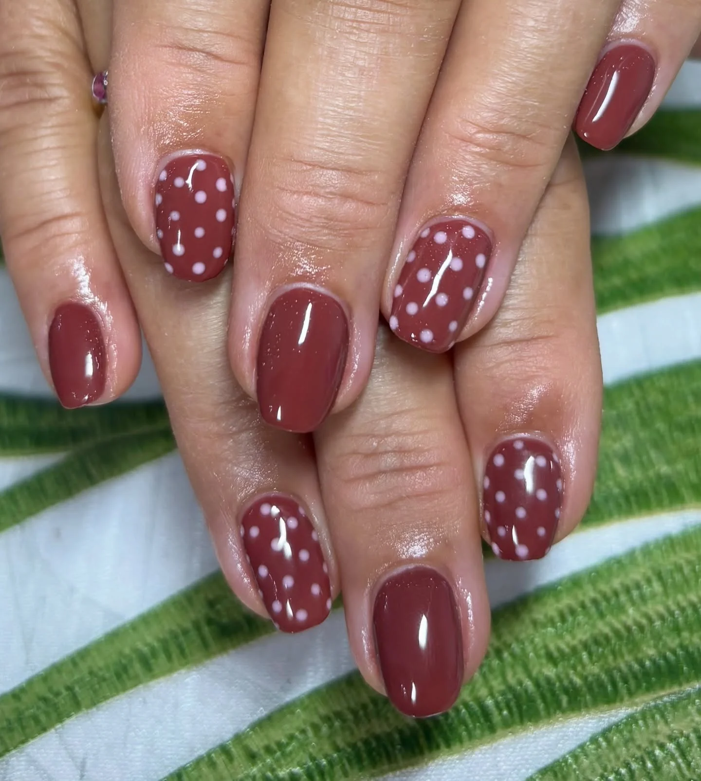 polka dot fall nails 2026 Glossy Maroon Nails With White Polka Dot Accents