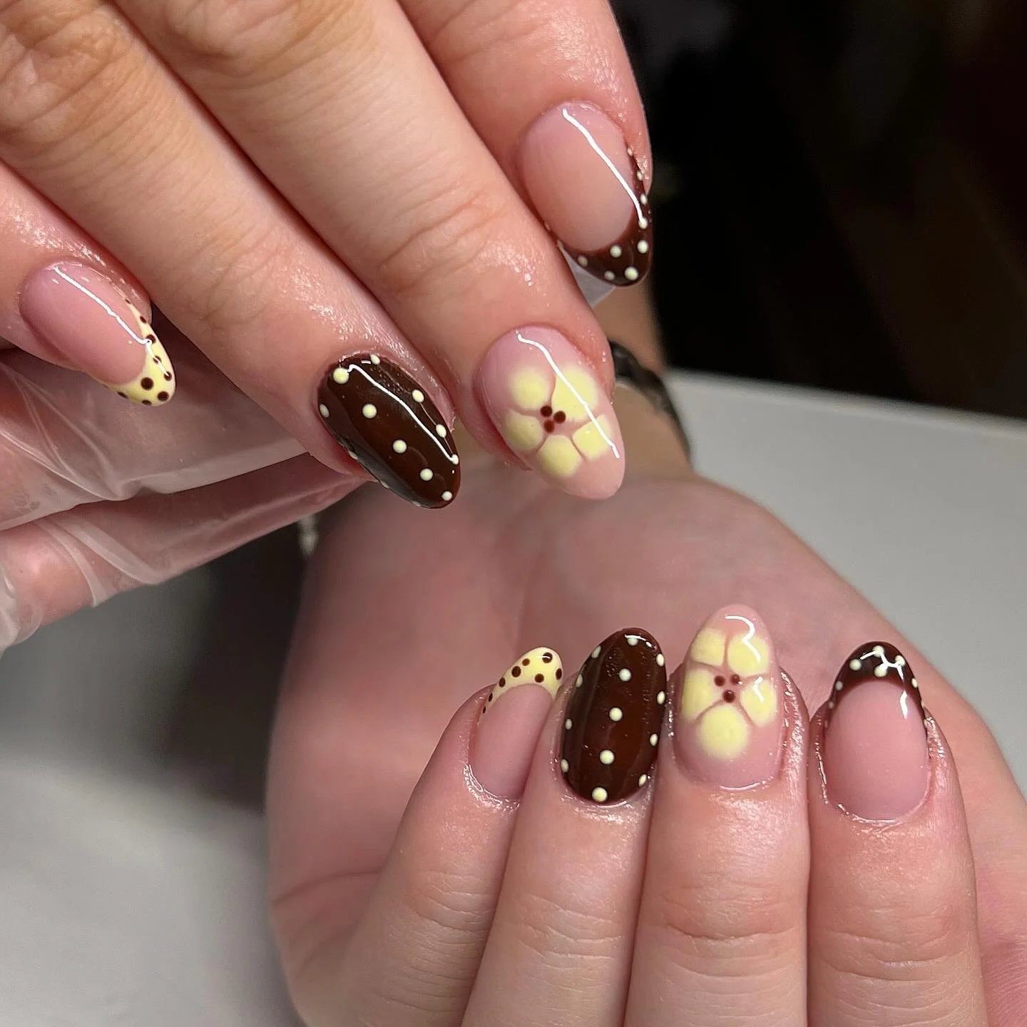 fall gel nails ideas 2026 Chocolate Daisy Nails With Playful Vintage Charm