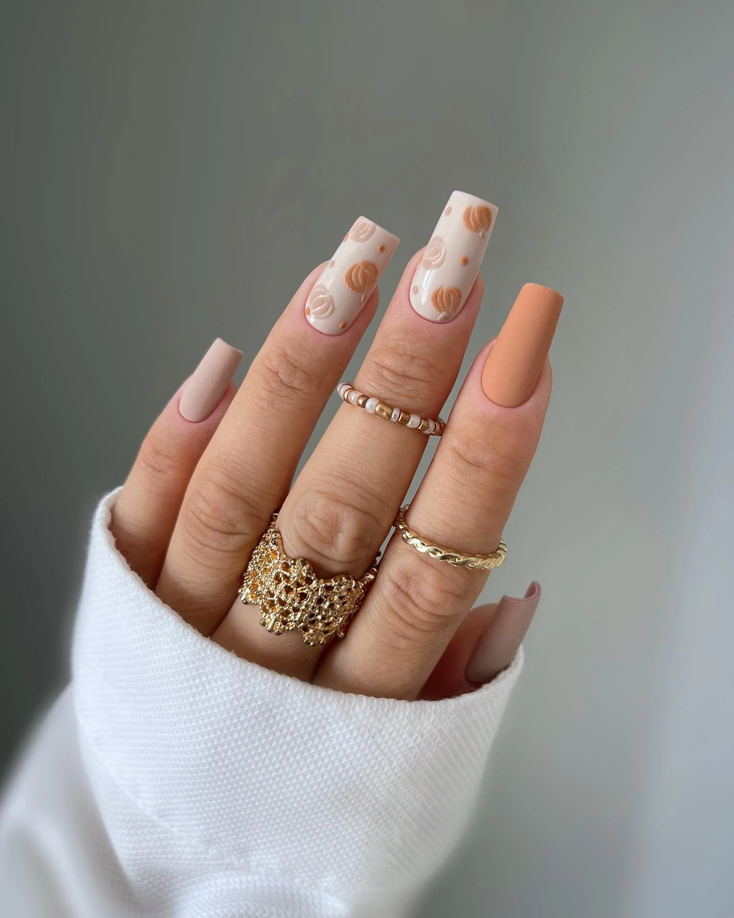 fall long nails 2026 Creamy Ivory And Caramel Sweater-Inspired Nails