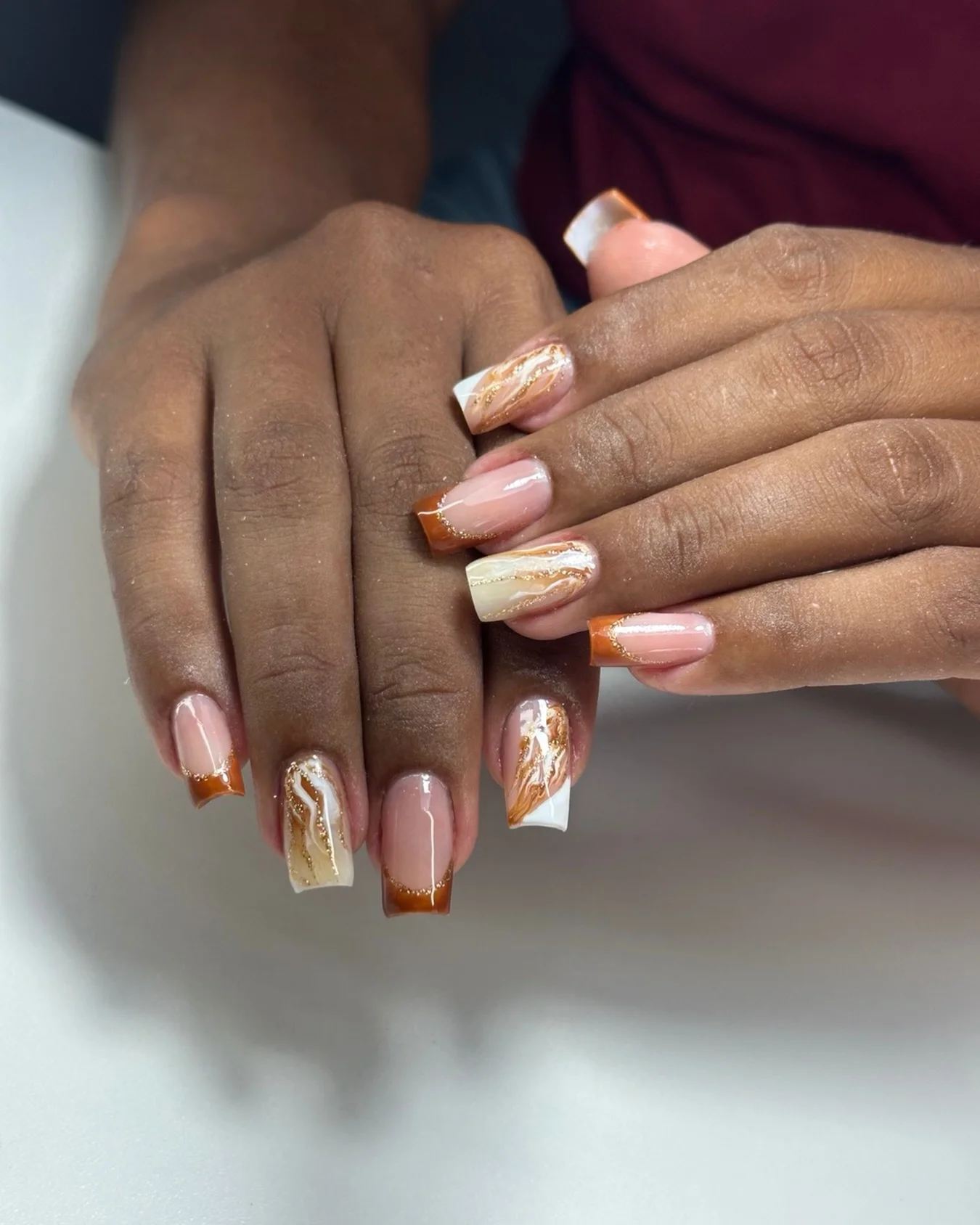 fall nails for brown skin tone Warm Caramel French Tips With Golden Marble Details