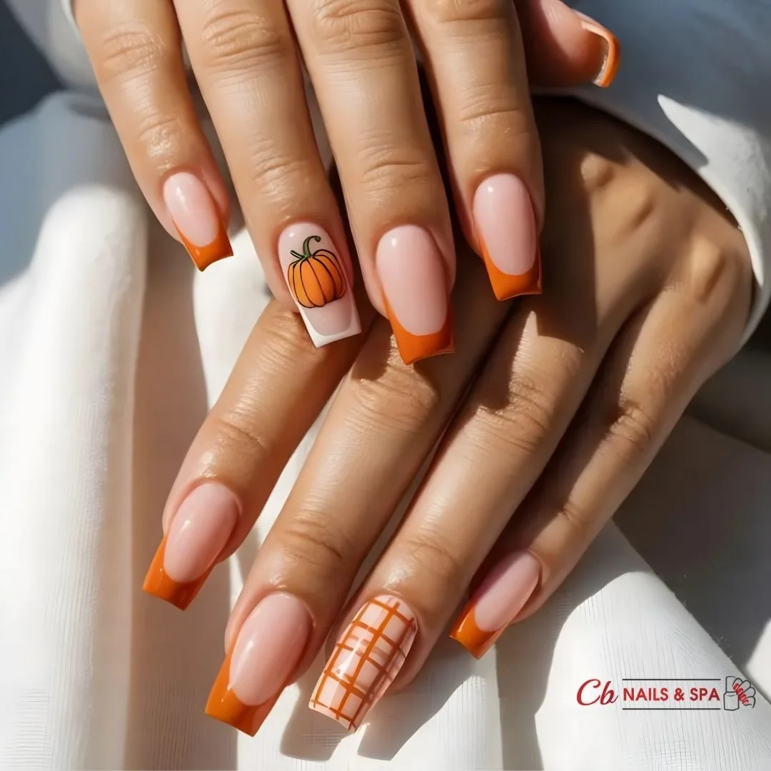 fall nails with pumpkins 2026 Orange French Tips With A Tiny Pumpkin Accent
