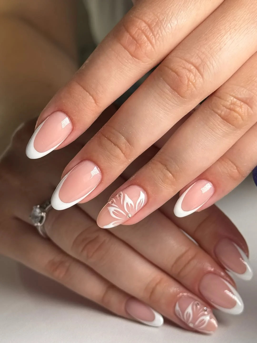 fall wedding nails 2026 Elegant Almond French With Sculpted Floral Accents
