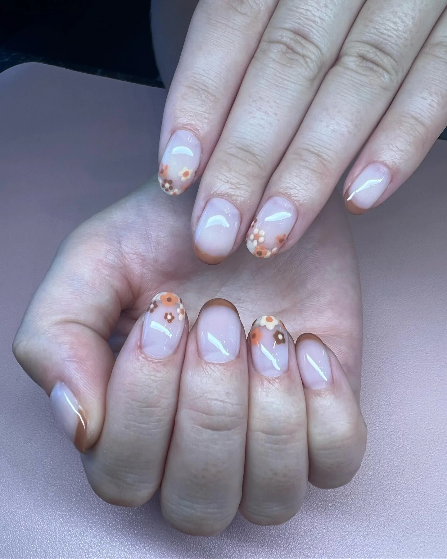 fall french nails 2026 Soft Floral French Tips With Delicate Neutral Details
