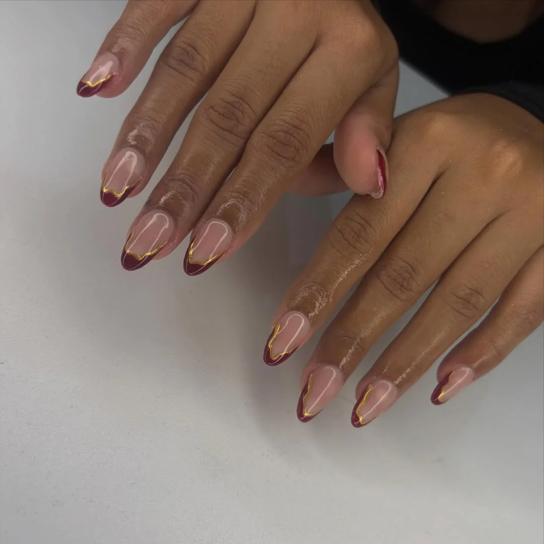 fall nails for brown skin tone Burgundy Almond Tips With Delicate Gold Lines