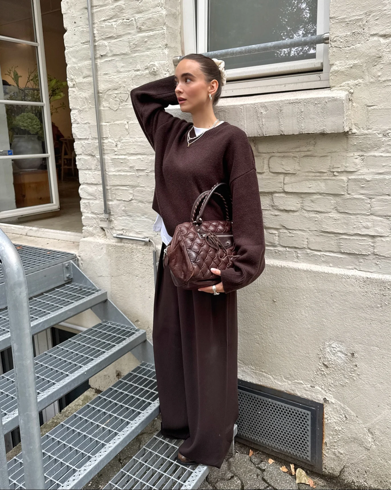 september fashion trends 2026 Chocolate Monochrome With A Quilted Handbag