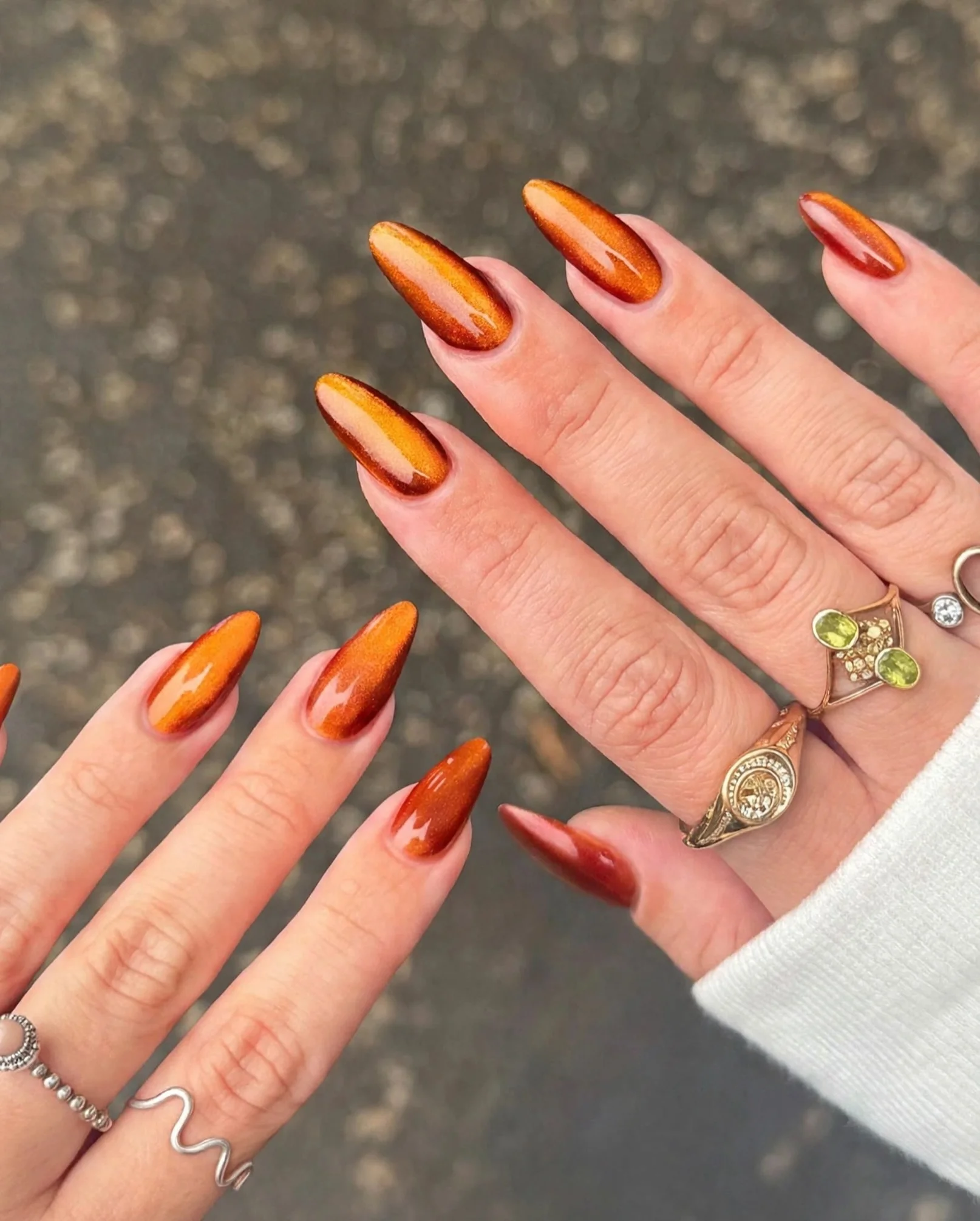 fall manicure colors 2026 Burnt Orange Chrome Nails For An Autumn Statement