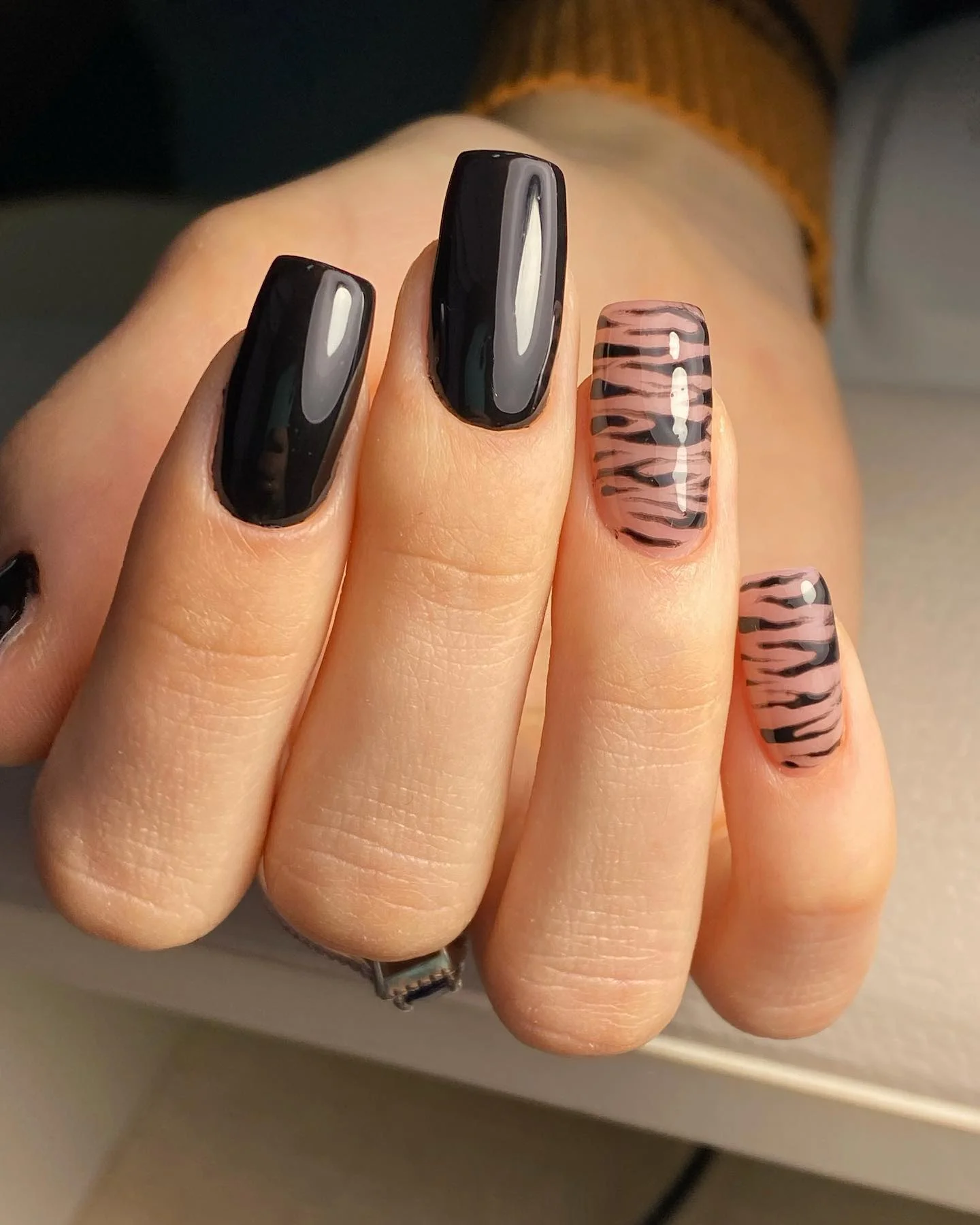 fall nails for pale skin 2026 Glossy Black And Bare Nails With Zebra-Like Lines