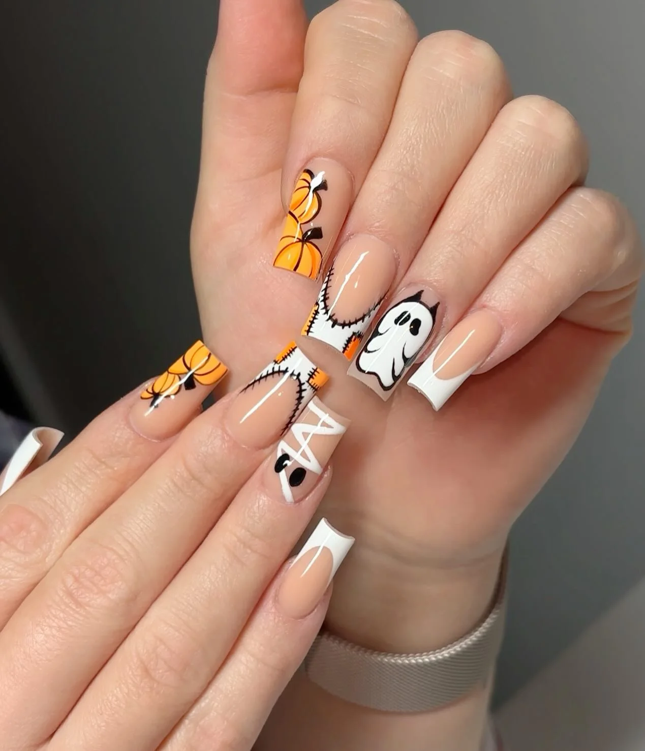 halloween nail art 2026 Stitched Pumpkins With Ghostly White Tips