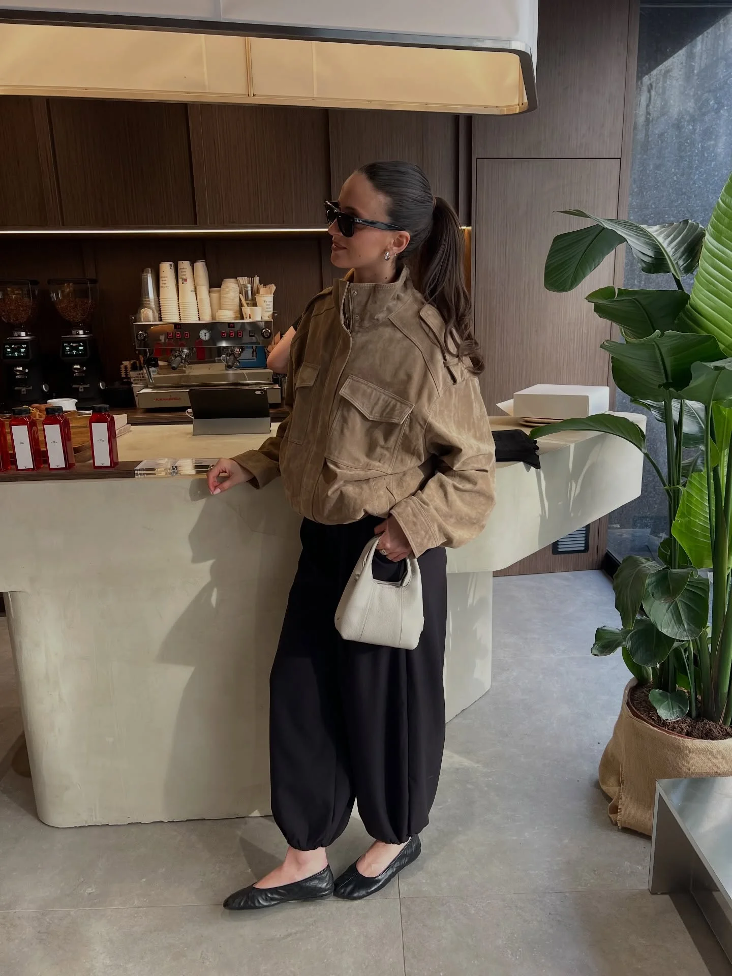 september fashion trends 2026 Utility Jacket With Relaxed Black Trousers
