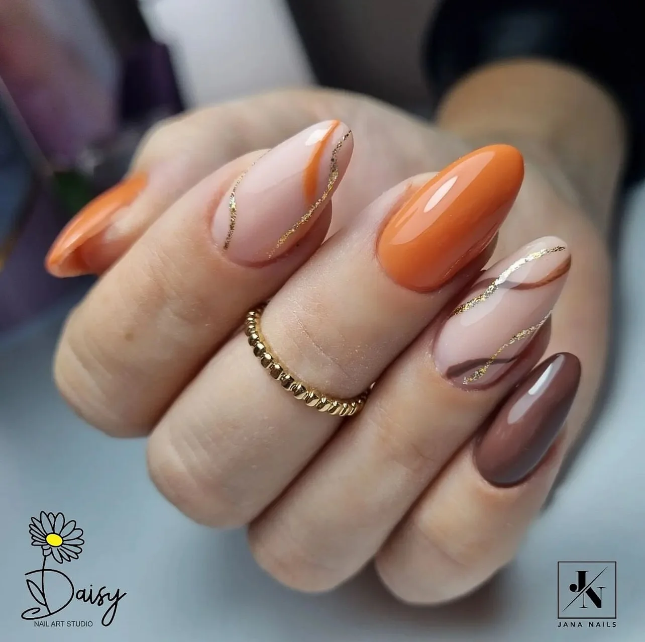 fall medium length nails 2026 Warm Orange And Golden Line Details