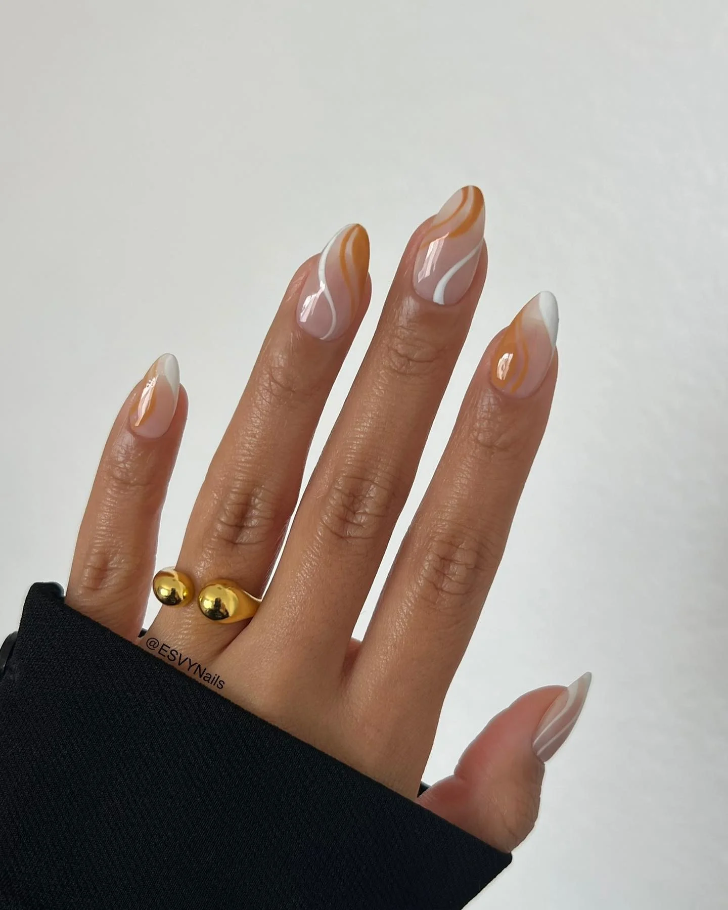 fall short almond nails 2026 Soft Caramel Swirls For A Modern Autumn Look
