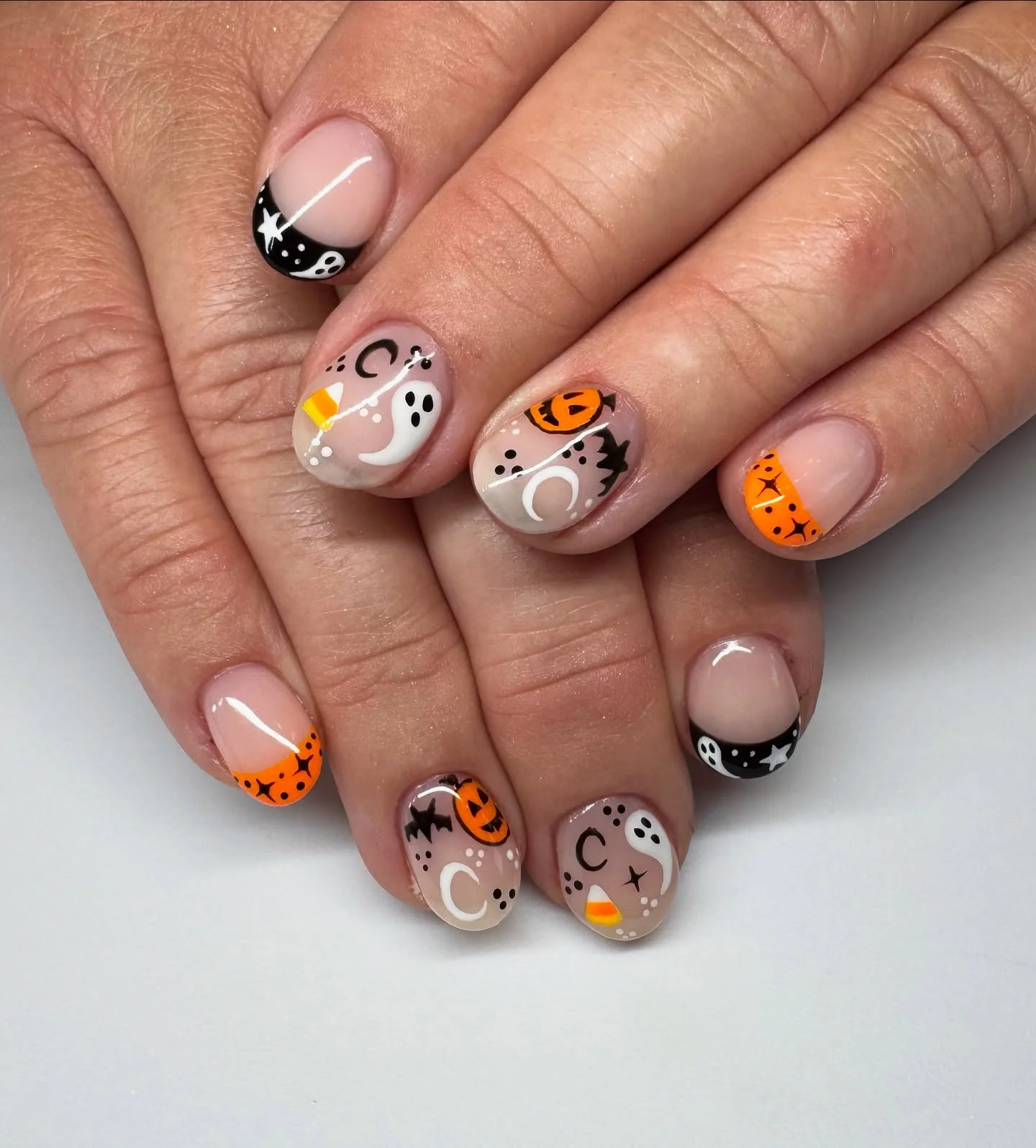 halloween nail art 2026 Playful Halloween French With Ghosts And Pumpkins