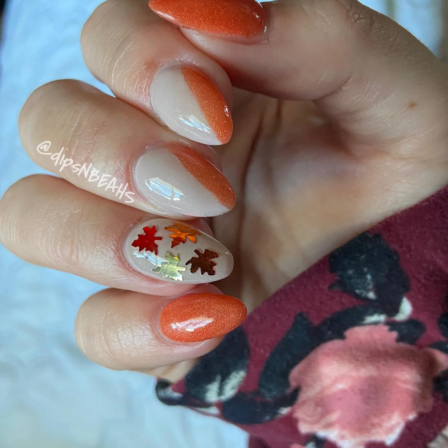 fall dip nails 2026 Sheer Almond Nails With Burnt Orange And Autumn Leaves