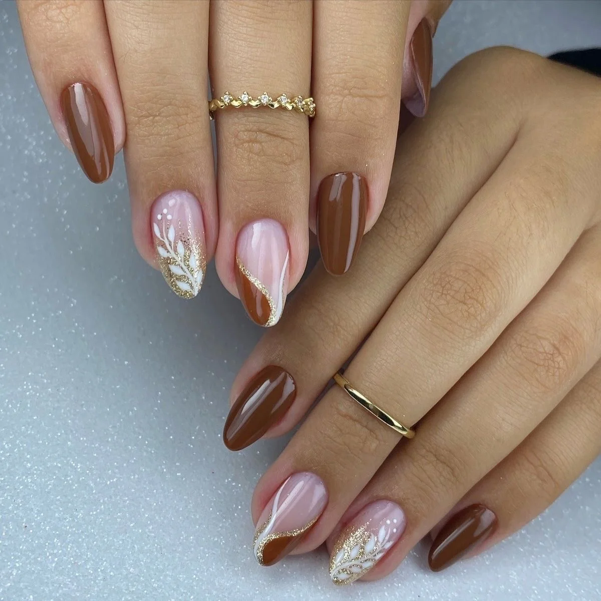fall mid length nails 2026 Chocolate Swirls With Elegant Gold Botanical Details