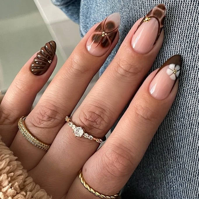 fall nail trends 2026 Chocolate French Tips With Delicate Floral Accents