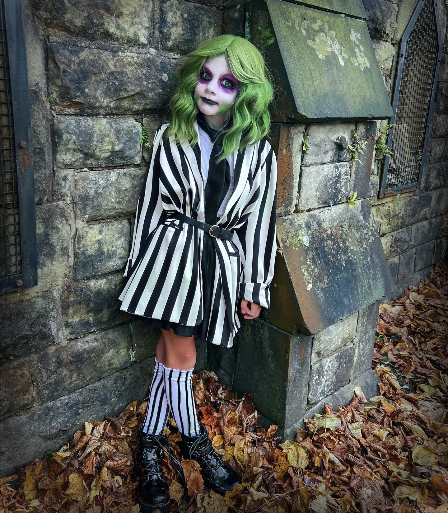 halloween costume for kids 2026 Bold Black And White Stripes With A Wicked Green Twist