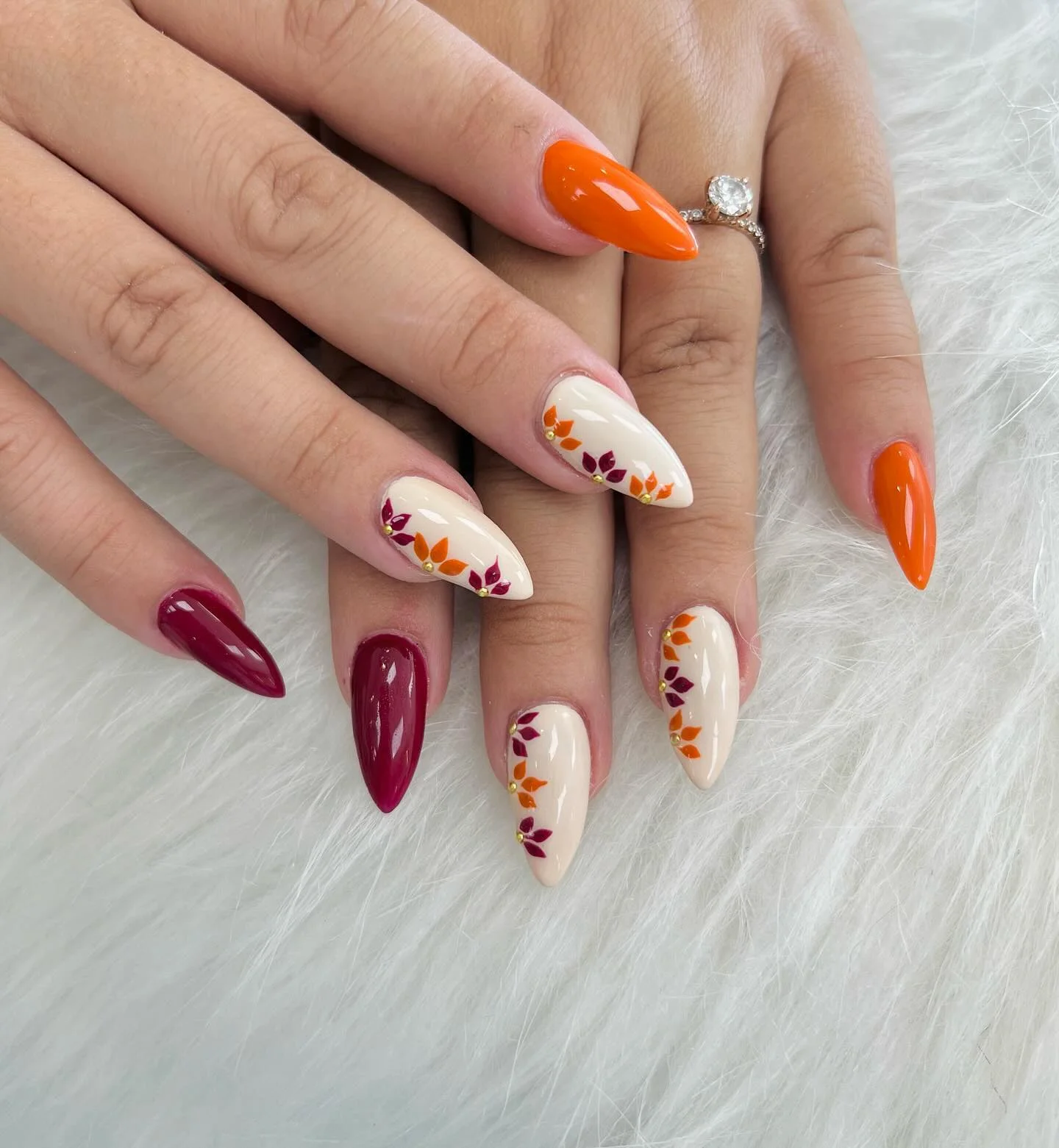 fall gel nails ideas 2026 Cream Orange And Berry Autumn Leaf Nails