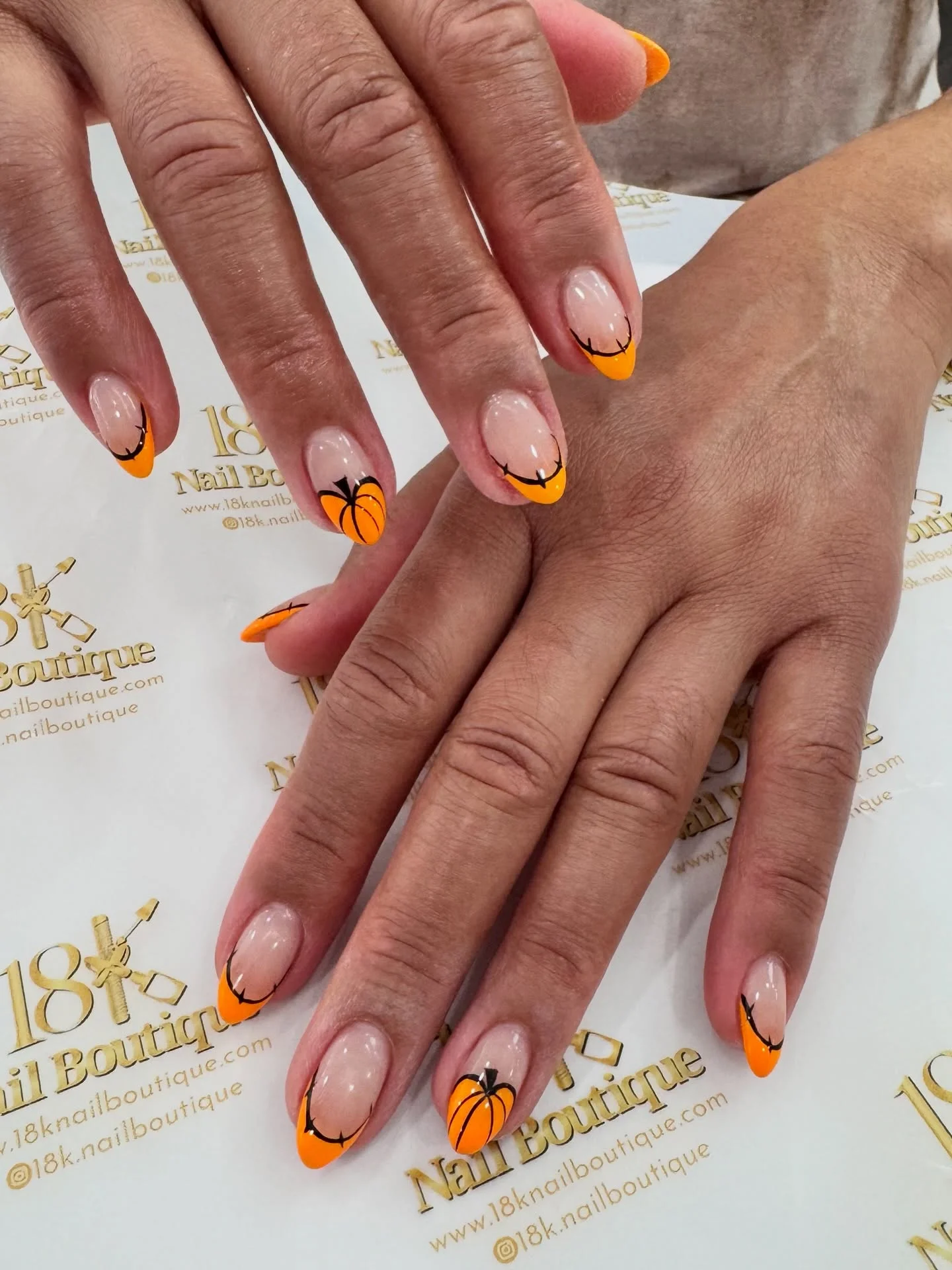 fall nails with pumpkins 2026 Orange French Tips With Delicate Pumpkin Details