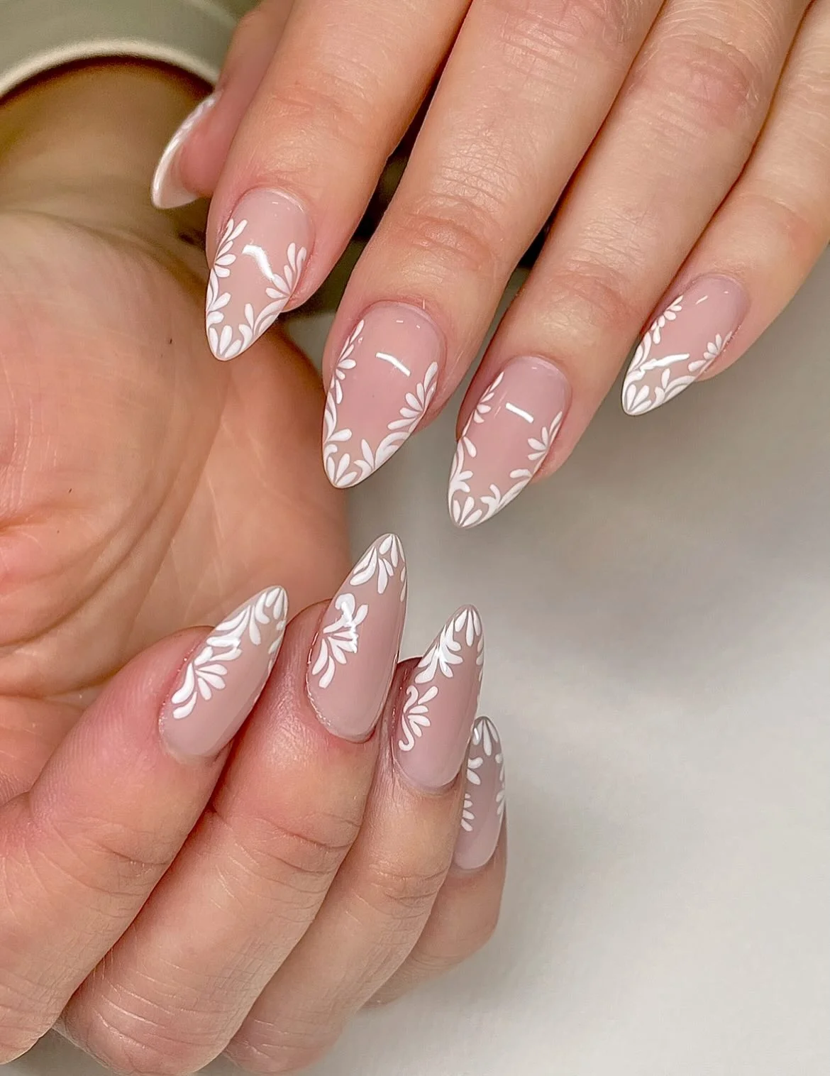 fall wedding nails 2026 Minimal White Botanical Details On Elegant Almond Nails