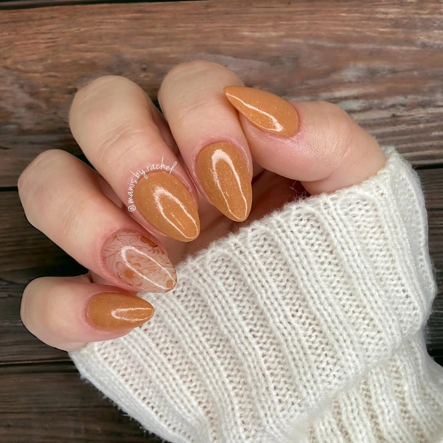 fall dip nails 2026 Warm Caramel Almond Nails With Delicate Botanical Details