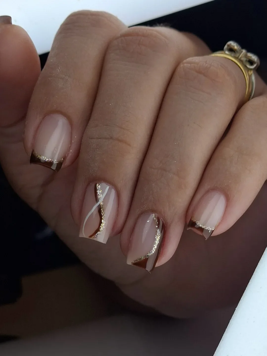 fall gel nails ideas 2026 Elegant Nude French Tips With Gold Waves
