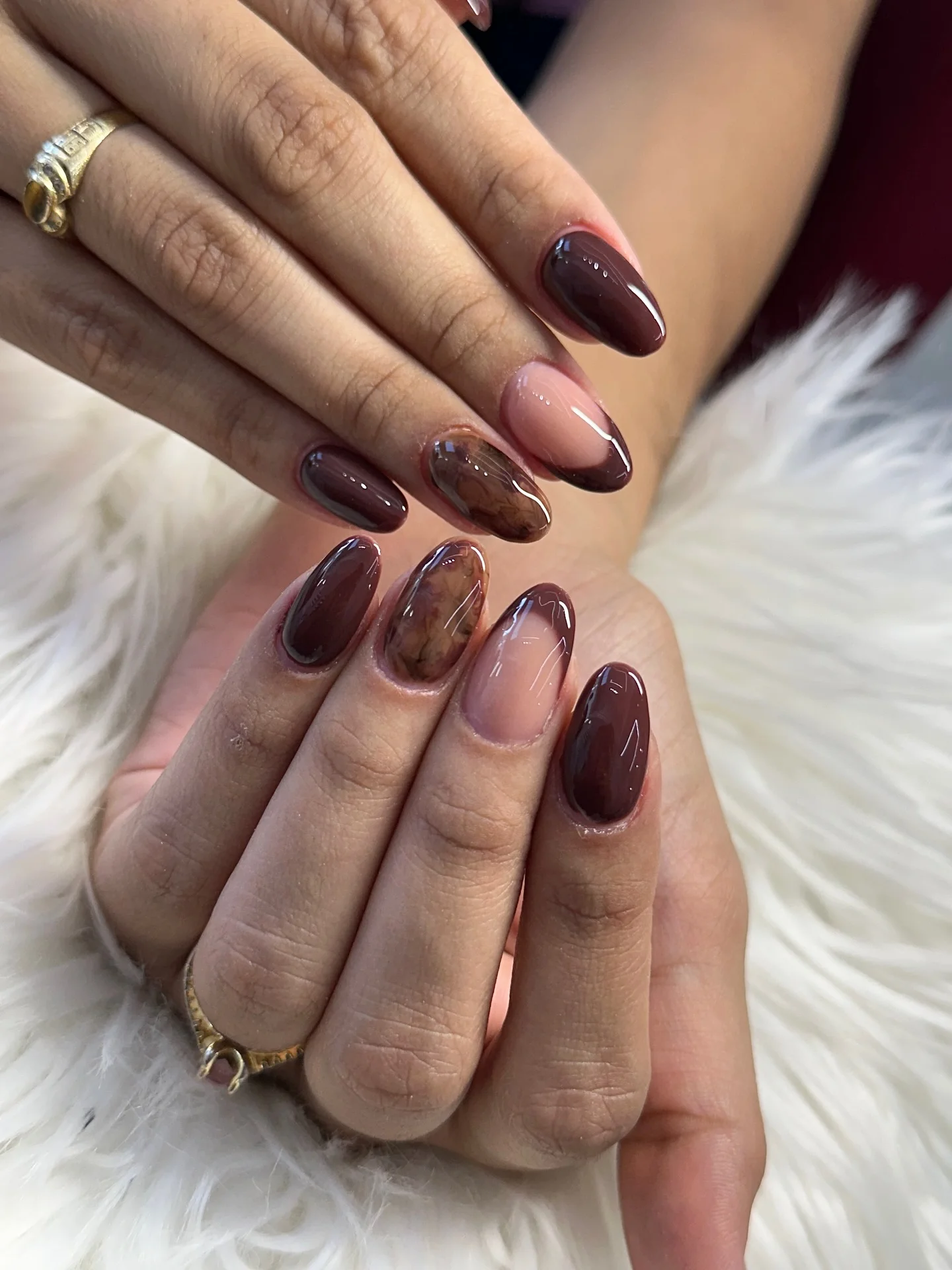 fall short almond nails 2026 Glossy Espresso Nails With Marble Accent Drama
