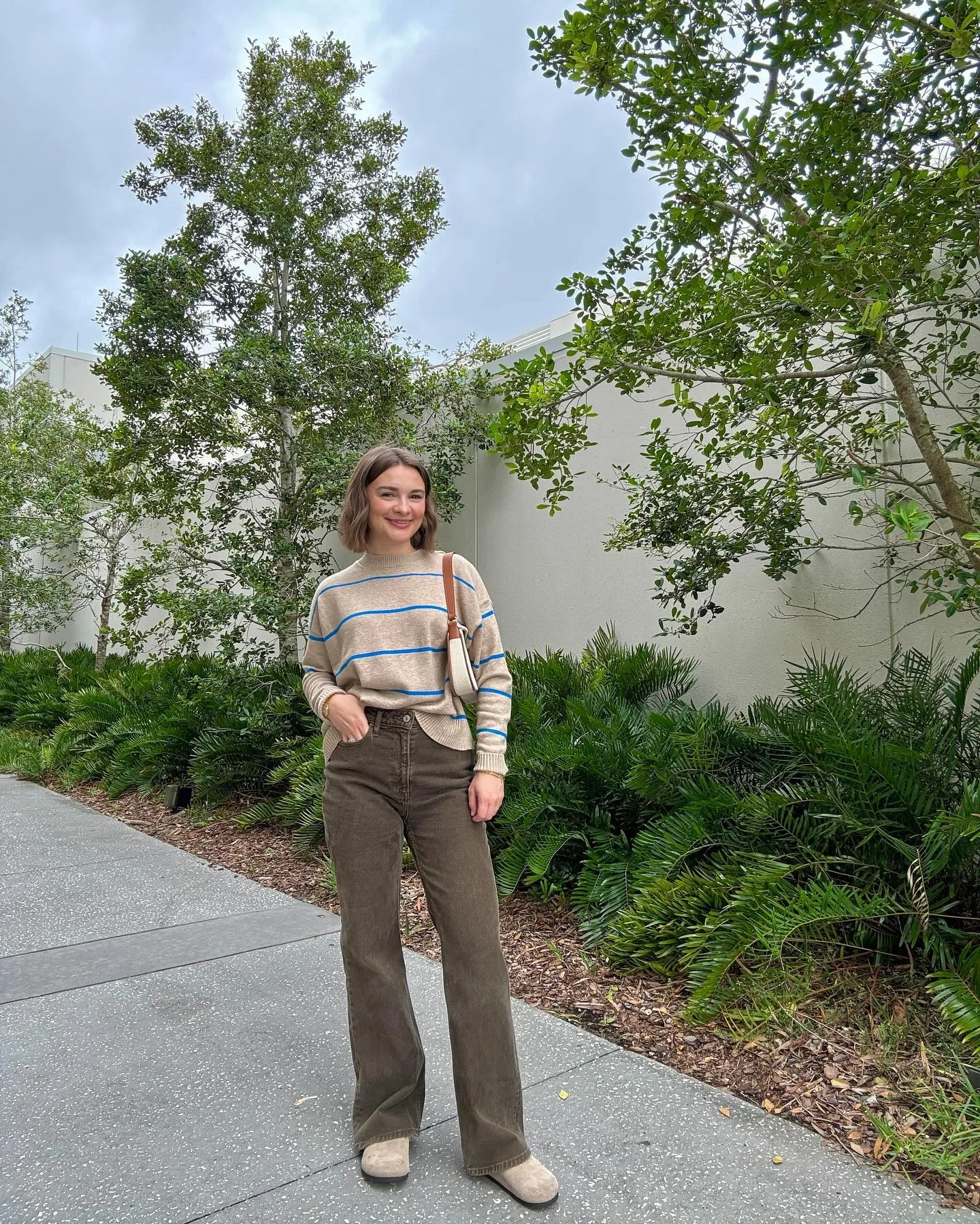 september outfit ideas 2026 Striped Knit With Earth-Toned Wide-Leg Jeans