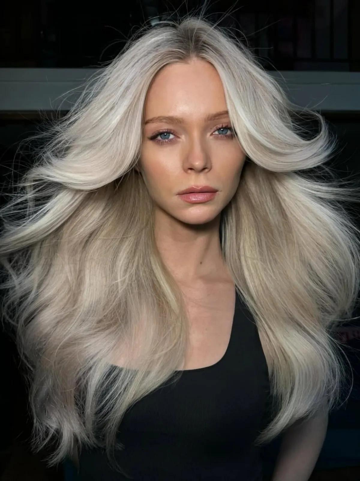 Dramatic Platinum Blonde with Face-Framing Layers Dramatic Platinum Blonde with Face-Framing Layers — Winter Hair Colors for Blondes